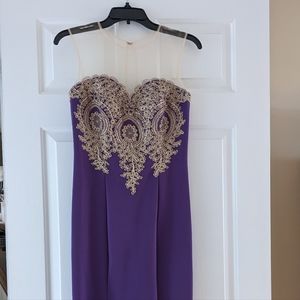 Size 4-6 Orchid Purple Gorgeous prom dress embellished with gold embroidery.